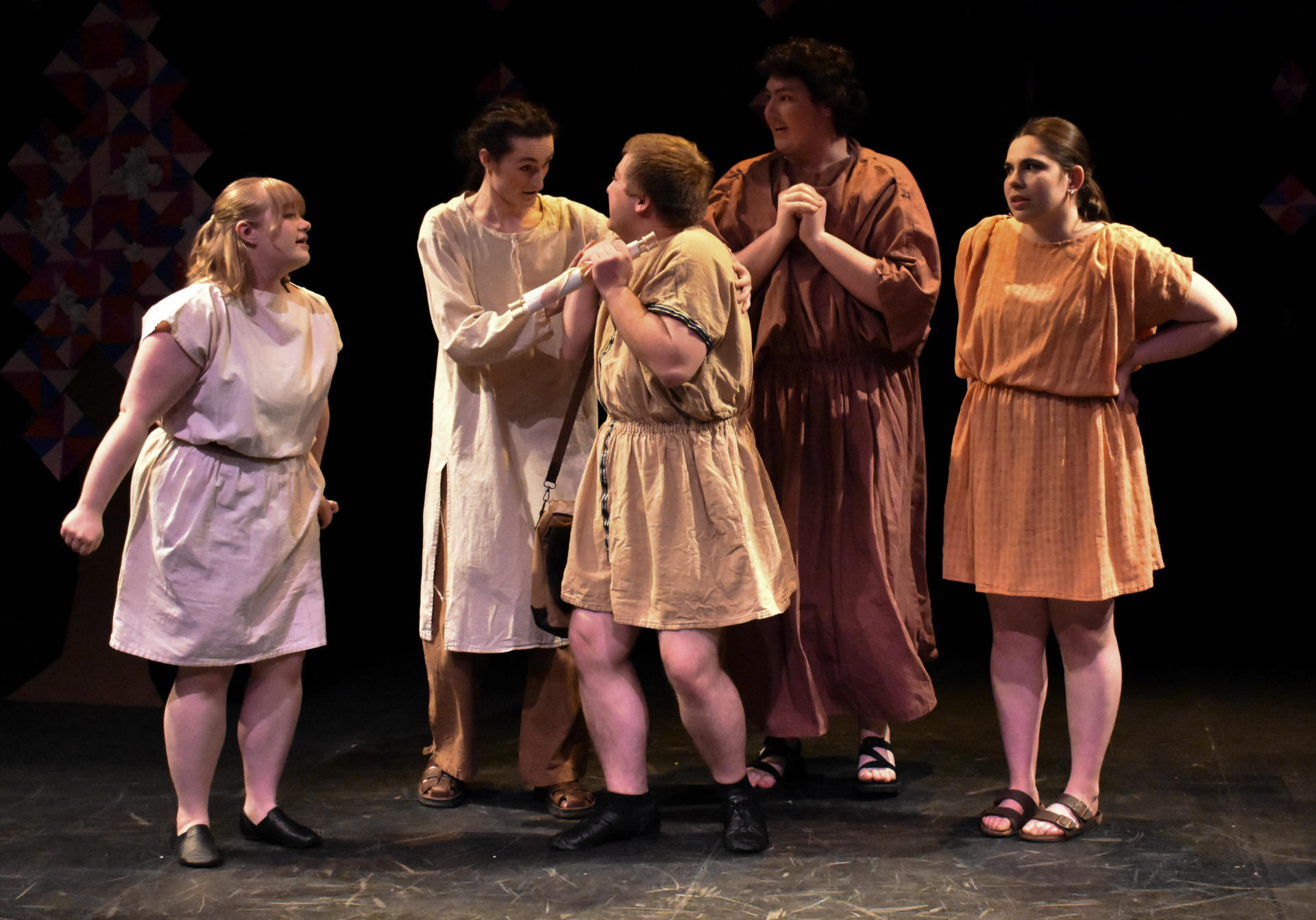 The mechanicals talk about putting on a play