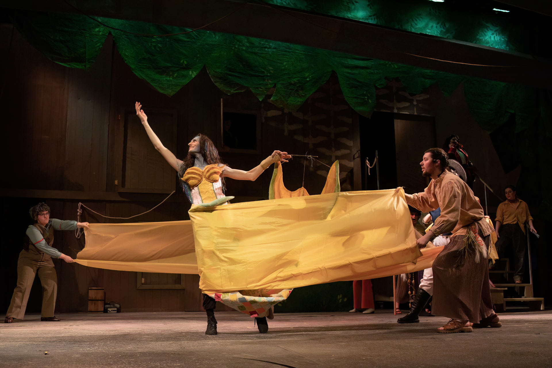 Teacher's entrance, with a choreographed display of gold sheets surrounding them.