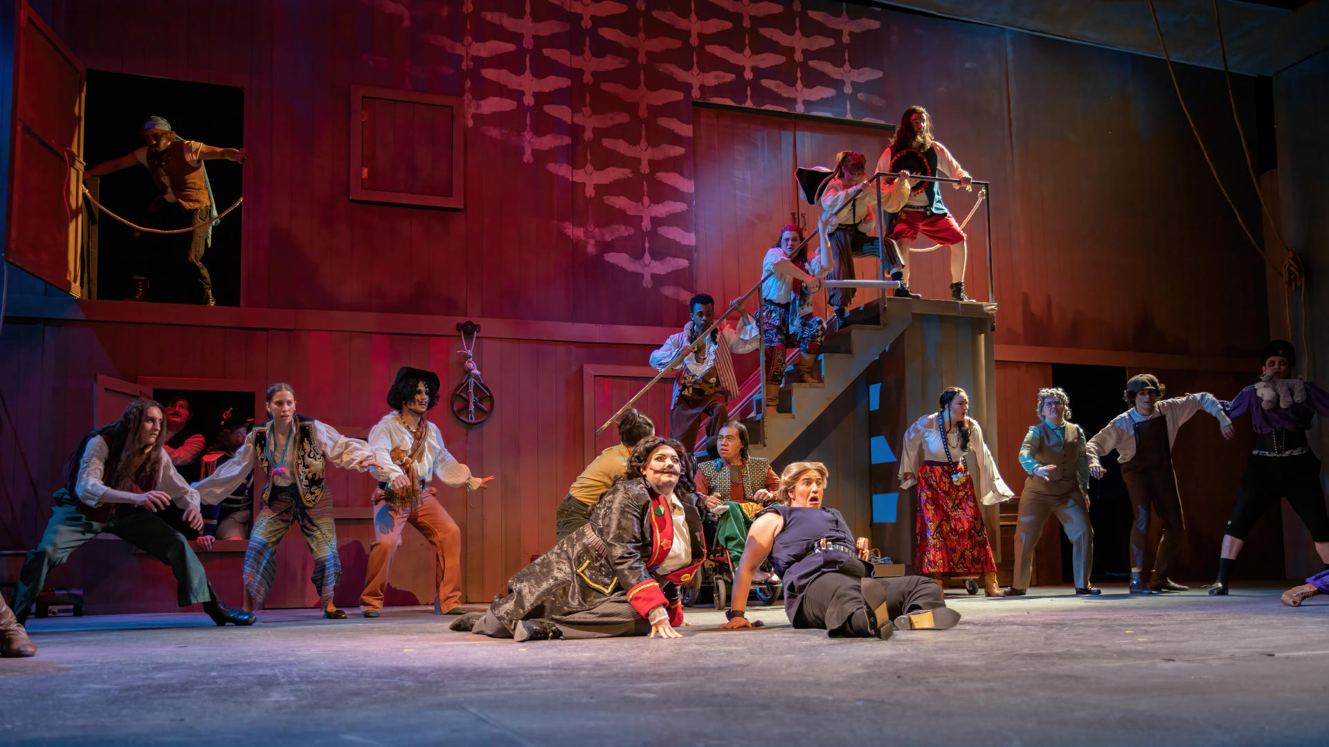The whole ensemble stumbles as the ship cracks in half.