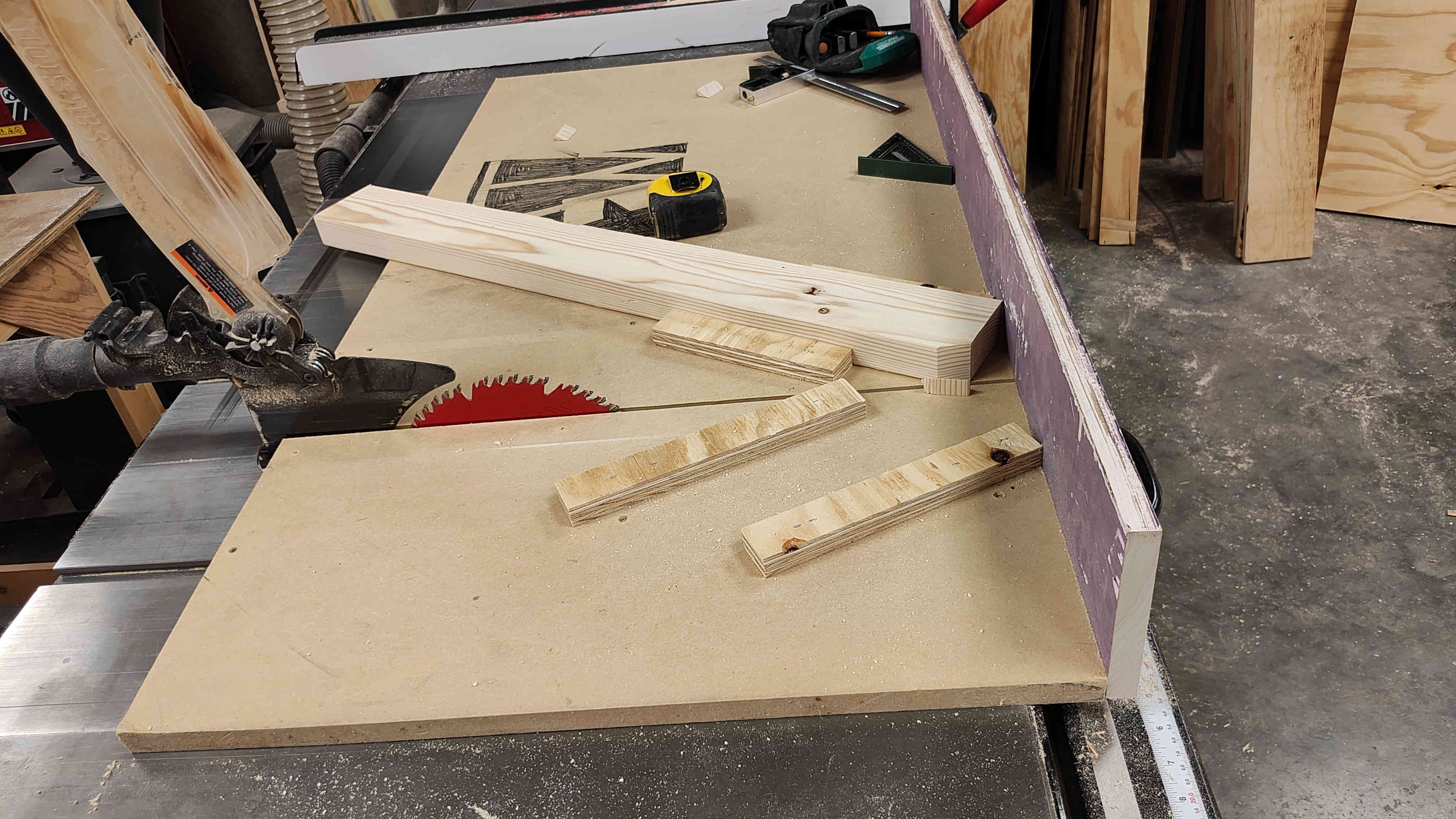 Tablesaw sled with a jig I made for creating chamfers