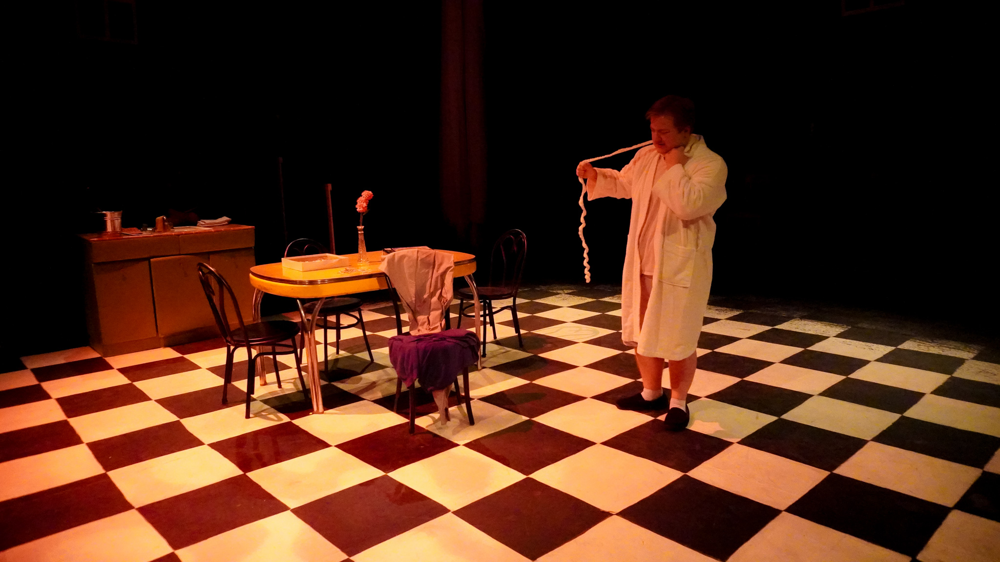 Fetus One (Matthew Gwinner) chokes himself with his umbilical cord in the shocking climax of Act Two of Three.